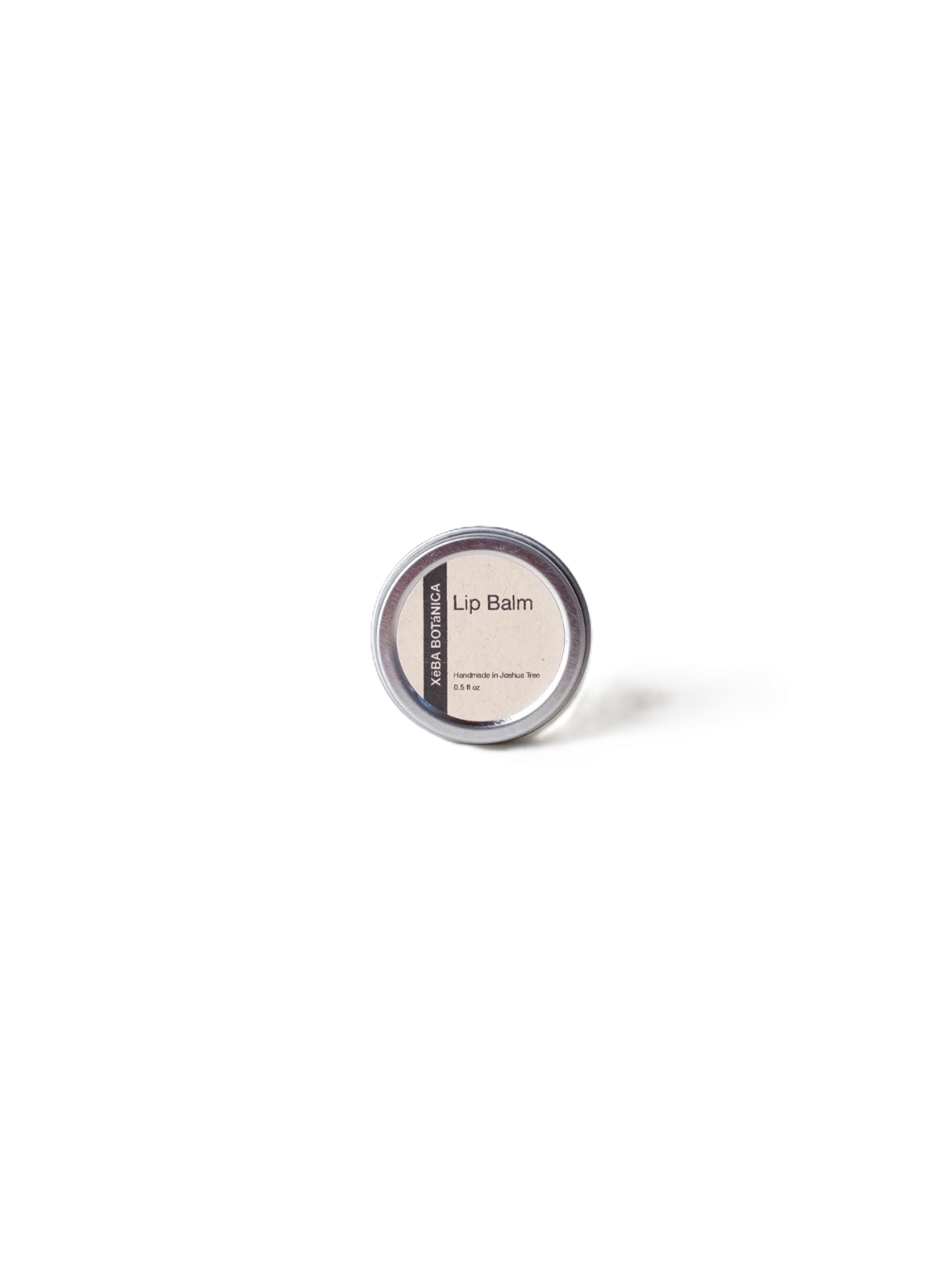Small round balm tin viewed from above