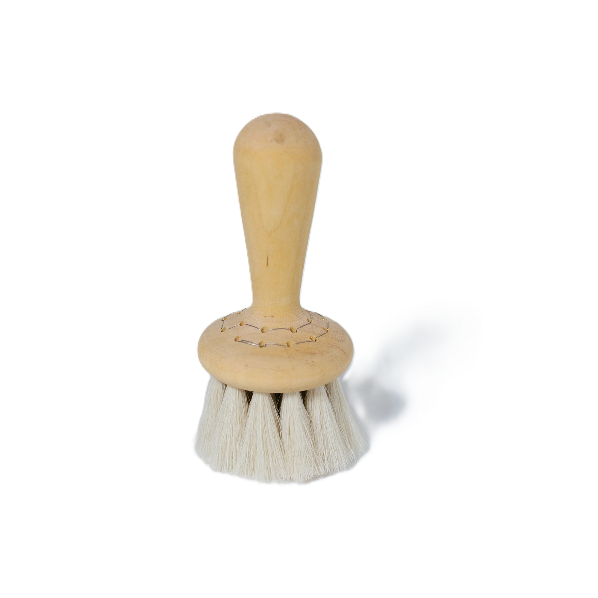 Round pale-wood brush with a stubby handle